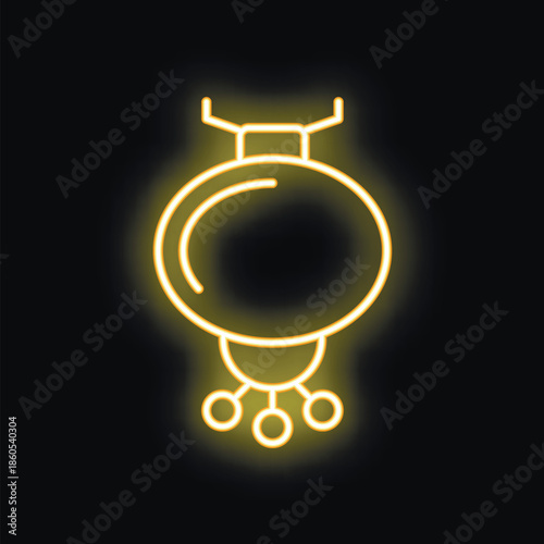 Neon sign representing christmas bauble shining brightly on black background
