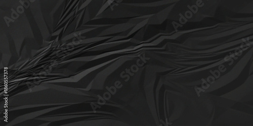 Abstract black parchment wrapping crumpled paper texture. creased page wrinkle retro rough distressed damage paper texture background.
