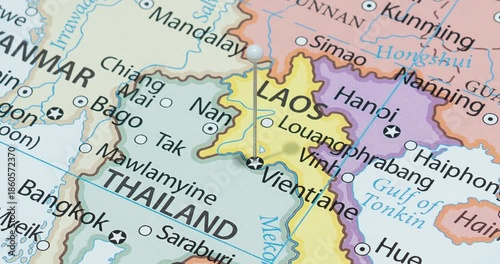 A zoom out of a white pin into vientiane city of laos political map