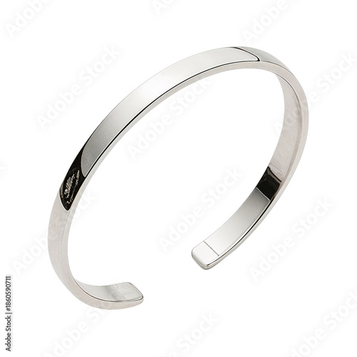 Silver Ring Placed on a Flat Surface Showing a Simple Design With No Stones o...