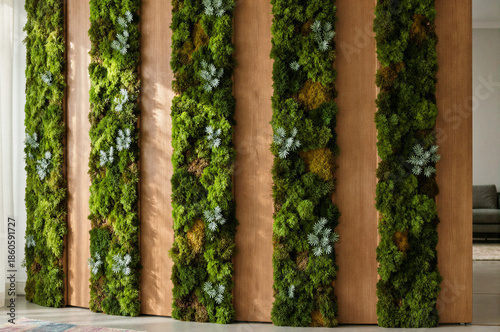 Vertical green moss walls with blue succulents on wooden panels in a modern interior space.