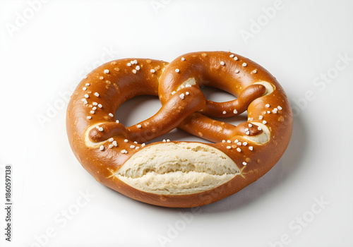 Golden Brown Pretzel with Coarse Salt Sprinkled on White Background baked bread
