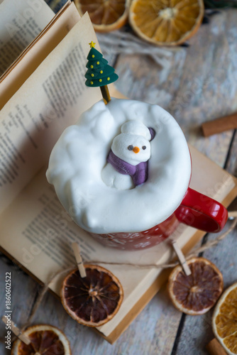 New Year's treats on the table and the symbol of the new 2026: a horse, tea, coffee, gingerbread and zephyr.