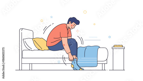 Young caucasian male sitting on bed putting on blue socks in minimalist bedroom