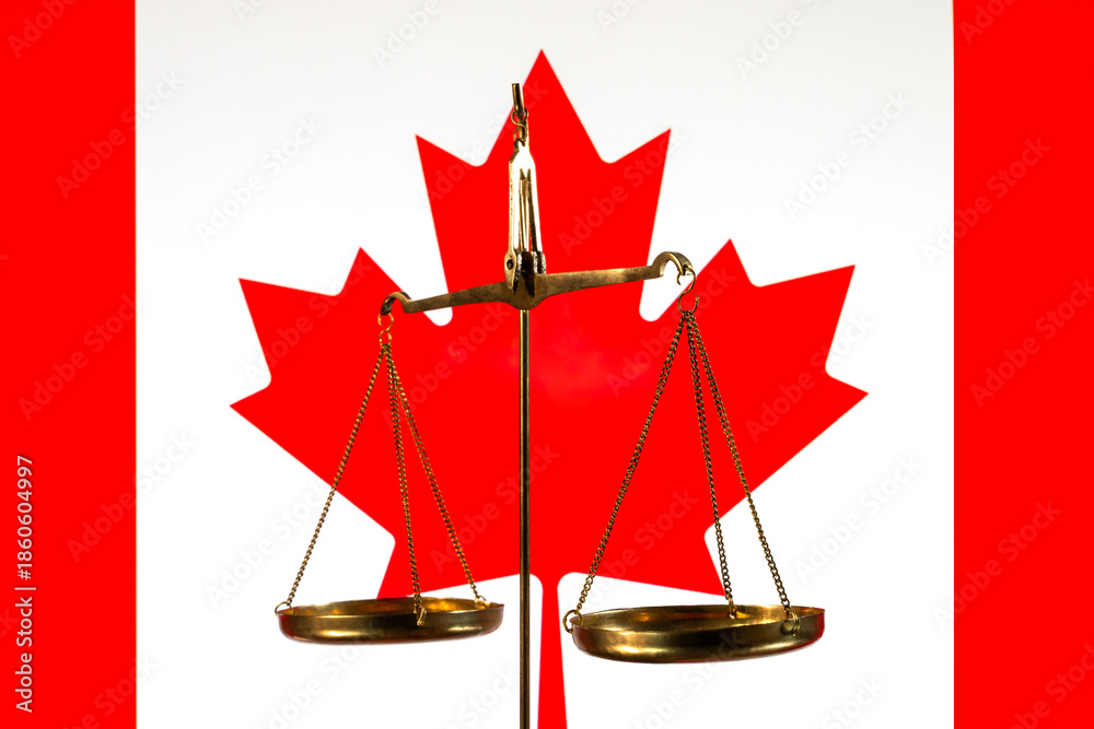 Φωτογραφία Golden scales of justice against the backdrop of the Canadian flag