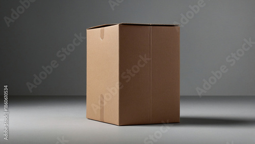 Tall Vertical Brown Kraft Cardboard Shipping Box Mockup, Blank Parcel for Logistics and Moving Services against Gray Background
