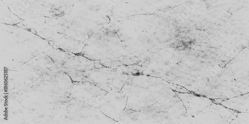A vintage white marble and grunge concrete wall texture featuring a rough stone pattern and gray paint on a weathered cement surface