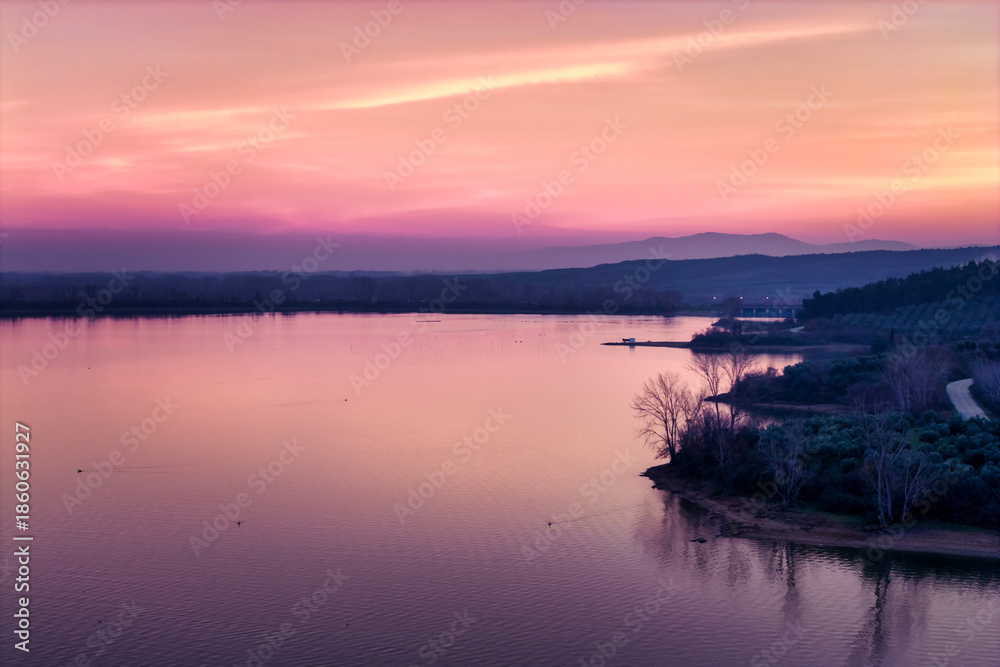 Fototapeta premium Sunrise Reflections on Calm Lake. Kerkini, Northern Greece