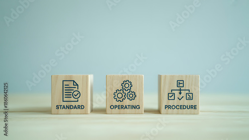 SOP Standard Operating Procedure Concept Visualized on Wooden Blocks for Business System Standardization.png