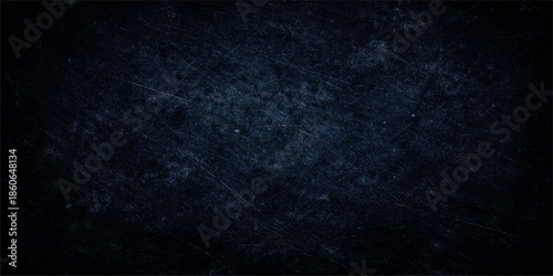 An abstract dark blue grunge wallpaper featuring a vintage textured surface with a rough material pattern and blank old paper backdrop design