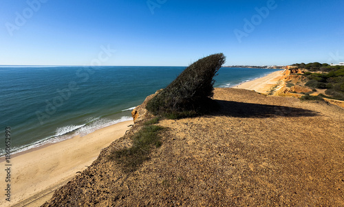 Rocky seashore. View of Praia da Vigia and Praia dos Arrifes beach in Albufeira, Algarve, Portugal, Europe.