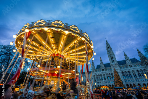 Traditional Christmas Carousel at the Famous Rathaus Market in Vienna at Night