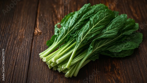 Fresh Leafy Greens on a Wooden Table, Ready for Cooking or Serving a Meal to ...