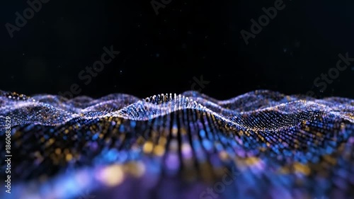 A dynamic wave pattern of blue and purple particles moving in a dark environment from a low viewpoint