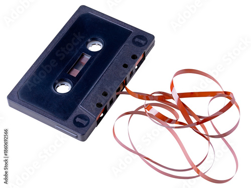 A cassette tape with unrolled tape for recording music. Isolated background.