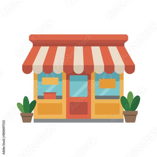 A charming small store with potted plants on either side of the entrance.