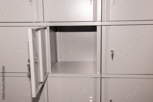 Metal safe box panel wall with open one. Concept for security and banking protection.