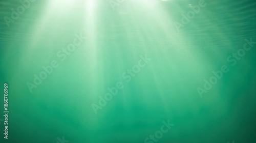 Underwater light rays animation with a gentle turquoise color palette and subtle particles