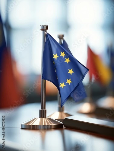 European union flag standing on a table during a meeting