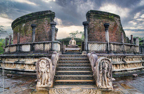 Vatadage - Circular relic stupa in monsoons, magnificent example of ancient Sinhalese art,built by King Parakrambahu I, contained relics of the Buddha in the 12th century  at Polonnaruwa, Sri Lanka