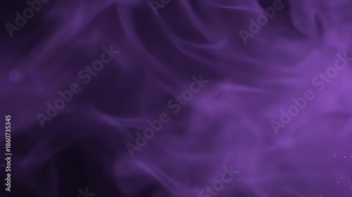 Abstract swirling purple smoke or vapor against a dark background, creating a mystical and ethereal atmosphere.