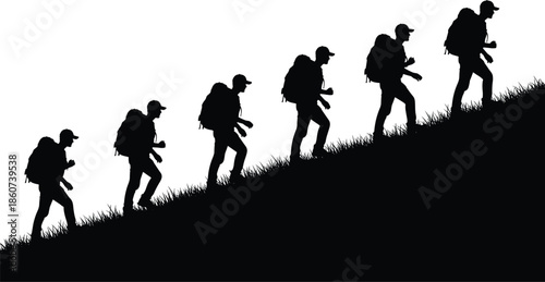 Silhouette of hikers climbing uphill in a line silhouettes grassy hill