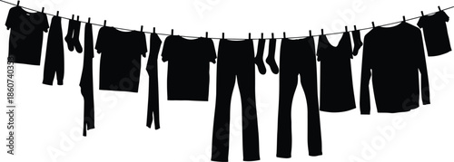Clothes hanging on a line clothesline laundry silhouette black