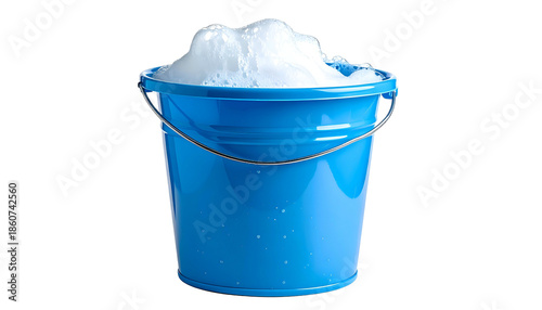 A blue plastic bucket filled with soapy white foam, handle raised. Isolated on black