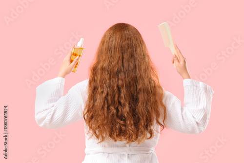 Young redhead woman with ha...