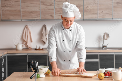 Male chef with dough and fr...