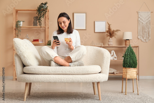 Beautiful woman with mobile...
