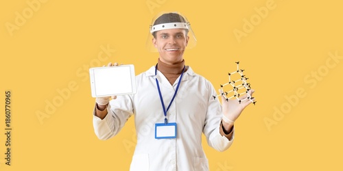 Male chemist with tablet co...