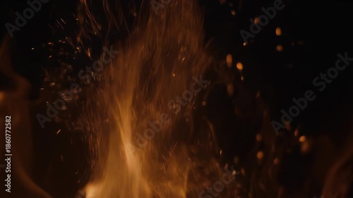 Cinematic Slow Macro Shot of Abstract Fire Embers Swirling in Dark Void with Ethereal Glow