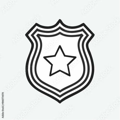 Simple black and white illustration of a shield with a star inside on a plain white background