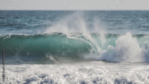 Powerful Ocean Wave Breaking with White Foam and Turquoise Water.