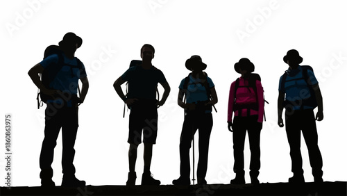 Group of hikers with backpacks standing together outdoors.