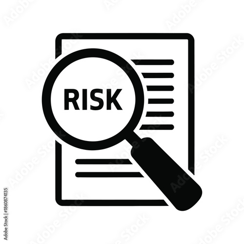 Magnifying glass inspecting the word 'RISK' on a document, symbolizing risk assessment and management analysis.