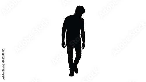 Silhouette of a thoughtful young man walking slowly with his head slightly bowed isolated against a pure white background representing contemplation or sadness