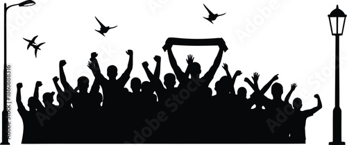 Silhouette of a joyful crowd celebrating with raised hands and banners at a nighttime event