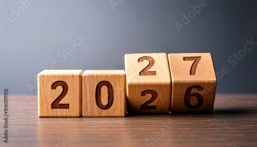  Flipping Wooden cube block for change 2026 to 2027, Countdown to 2027. Loading year 