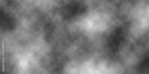 An abstract black and white background featuring a dark motion texture of smoke and mist swirling through a stormy night sky with light clouds