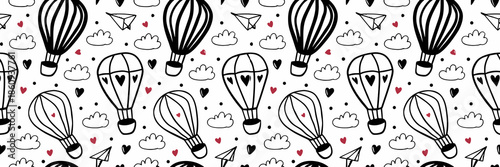 Whimsical hot air balloons in romantic sky setting