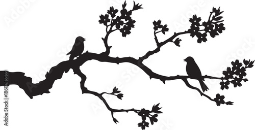 Two black birds on a tree branch with leaves silhouette