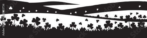 Black and white silhouette of a rolling landscape with trees and flowers