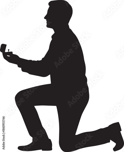 Silhouette of a man proposing on one knee with a ring