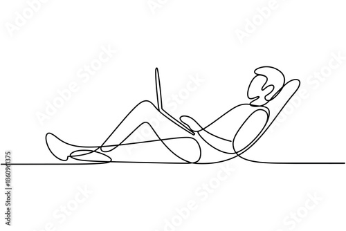 Relaxed person using a laptop while reclining, embodying remote work or leisure.