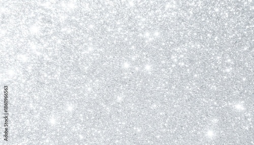冬や雪のイメージ　シルバーの背景に繊細な光がキラキラと輝くラメとパウダーのおしゃれテクスチャ背景素材