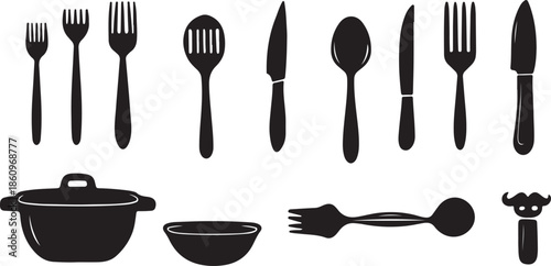 A shiny silver set of cutlery featuring a fork, spoon, and knife isolated on white as essential metal kitchen utensils for a restaurant dining table