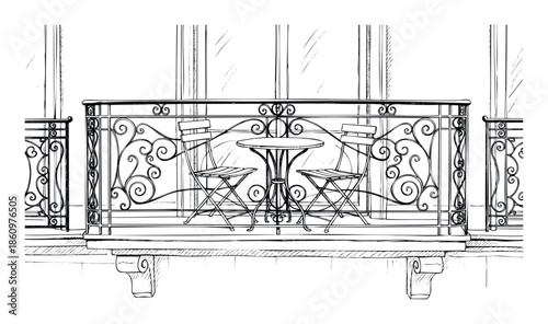 Ornate wrought iron balcony featuring a cozy round table and two folding chairs, perfect for evoking a classic architectural aesthetic in various design and lifestyle applications.