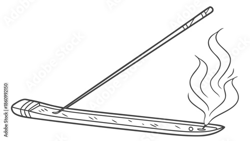 Aromatic incense stick burning on a decorative holder, releasing gentle smoke